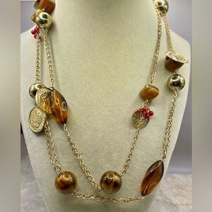 Chico's Gold and Amber Necklace with Red Accent Beads and Coin Charms. 40 inches